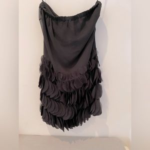 Jenny Han black strapless dress with cut petal detail on skirt in size M